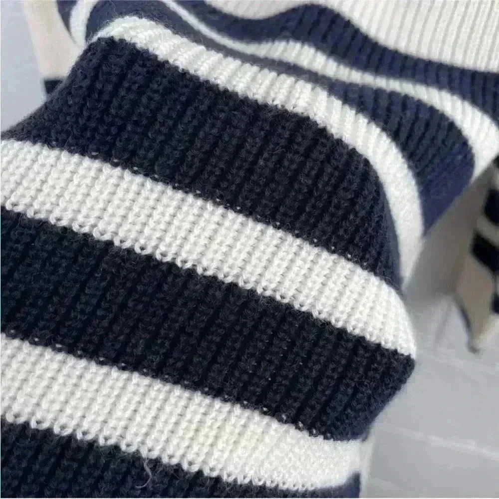 COS Roll neck sweater in white and black striped wool and cotton blend